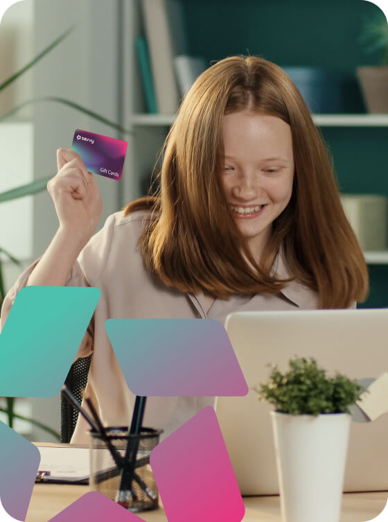 Girl excitedly using gift card online