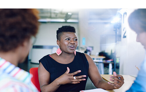 Lady talking in meeting